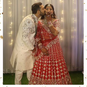 Couple Posing - The Magic Mirror - The PhotoBooth Company